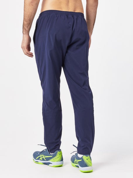 ASICS CORE WOVEN PANT - Tracksuit bottoms - performance black