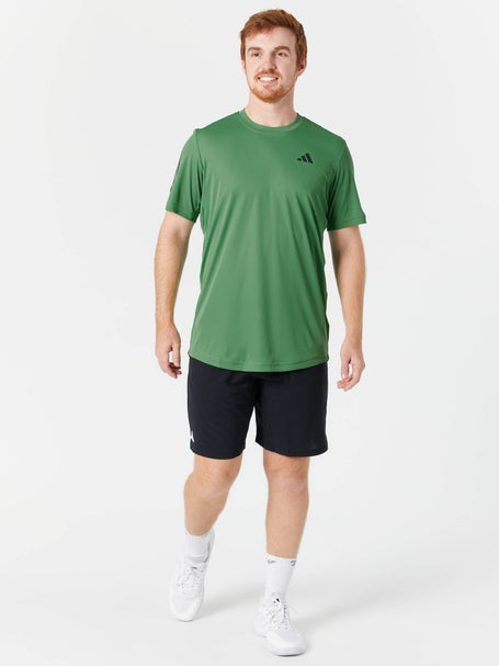 white adidas top with green stripes