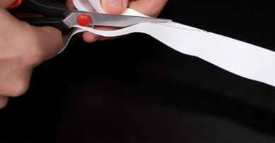 Trimming excess overgrip